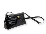 un sac à main en cuir de crocodile noir avec un fermoir doré