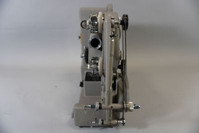 Projecteur Heurtier Triple format avec objectif dans sa cais…