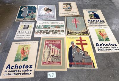 a lot of posters on the floor of a building