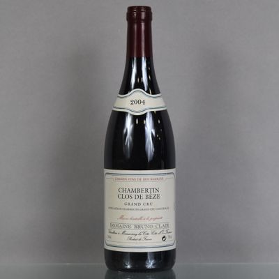a bottle of wine that is sitting on a table