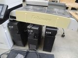 a lot of electronic equipment that are sitting on the floor