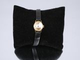 an image of a wrist watch with a black band on a black case