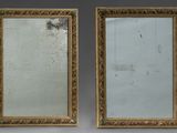 pair of antique gold framed mirrors with floral decoration