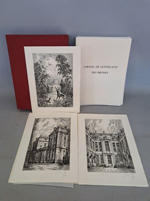 trois livres illustrés de bâtiments et d'arbres, posés sur une table