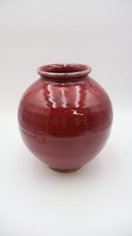 CHEVALLEY : vase boule en céramique rouge de cuivre H : 29 