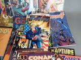 a lot of comic books that are on the table