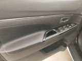 a close up of a car door handle with the door handle open