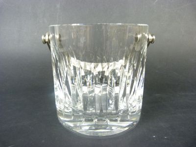 a glass vase that is sitting on a table
