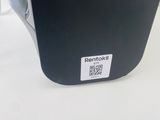 a black box with a sticker on it sitting on a table