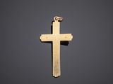 a gold cross on a black background