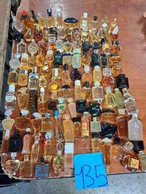 a lot of bottles of alcohol on a table
