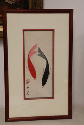 a picture of a picture of two koi fish in a frame