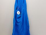 a blue dress hanging on a hanger on a wall