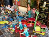a glass table with a lot of toy figurines on it