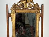 a mirror on a stand with a mirror on it