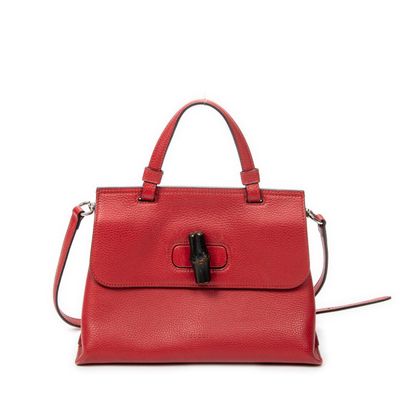 a red handbag on a white background