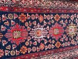 an image of a rug hanging on a wall on the floor