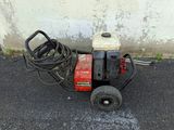a small machine that is sitting on the ground