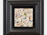 un tableau dans un cadre noir, avec l'image d'un oiseau à l'intérieur