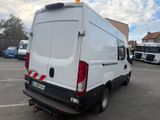 a white van that is parked in a parking lot