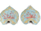 pair of blue and gold painted shell shaped vases with boats on them