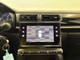 a picture of a car dashboard with a game on the screen