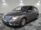 the mercedes b - class is parked on a checkered floor