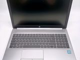 a laptop computer that is sitting on a table