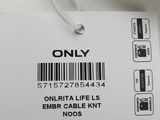 a label that says only on the label of a knitted sweater