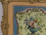 a picture of a picture of a vase with flowers in it