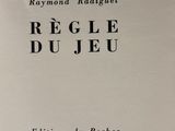 a close up of a book with black writing on it