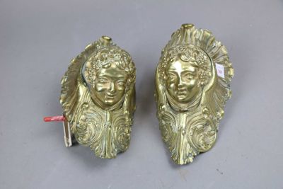 pair of antique brass figurines of a woman and a man