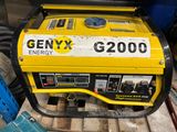 a generator that is sitting on a pallet in the garage