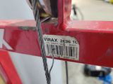 a close up of a barcode attached to a red bike
