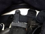 a close up of a black belt on a motorcycle
