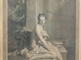 an old picture of a woman sitting on the ground with her legs crossed