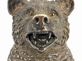 a statue of a bear that is on a table