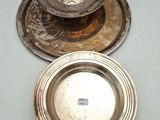 silver plate with a silver lid and a silver plate with a silver lid