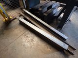 a man that is standing next to a pallet