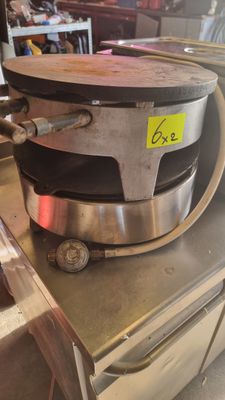 an image of a waffle maker on a counter