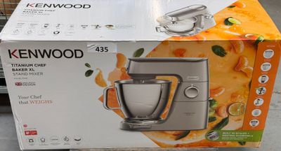 packaging of a kenwood stand mixer on display in a store