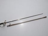 pair of silver plated swords and a sword on a white surface