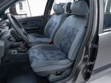a car that has a blue seat cover on it