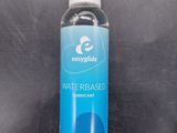 a bottle of water that is sitting on a table