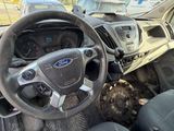 a steering wheel and dashboard of a truck with a steering wheel