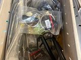 a box full of assorted items sitting on the floor
