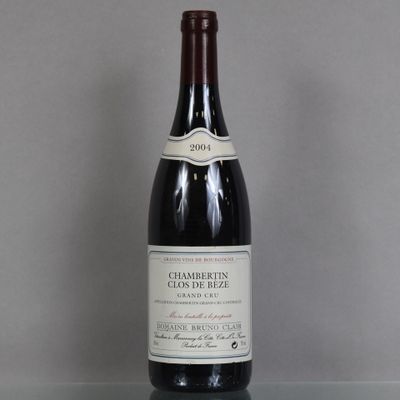 a bottle of wine that is sitting on a table