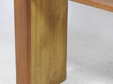 a wooden bench that is made out of wood