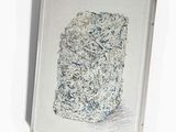 a picture of a picture of a rock on the wall