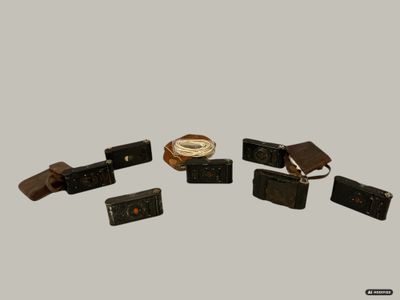 a lot of different types of electronic devices on a table